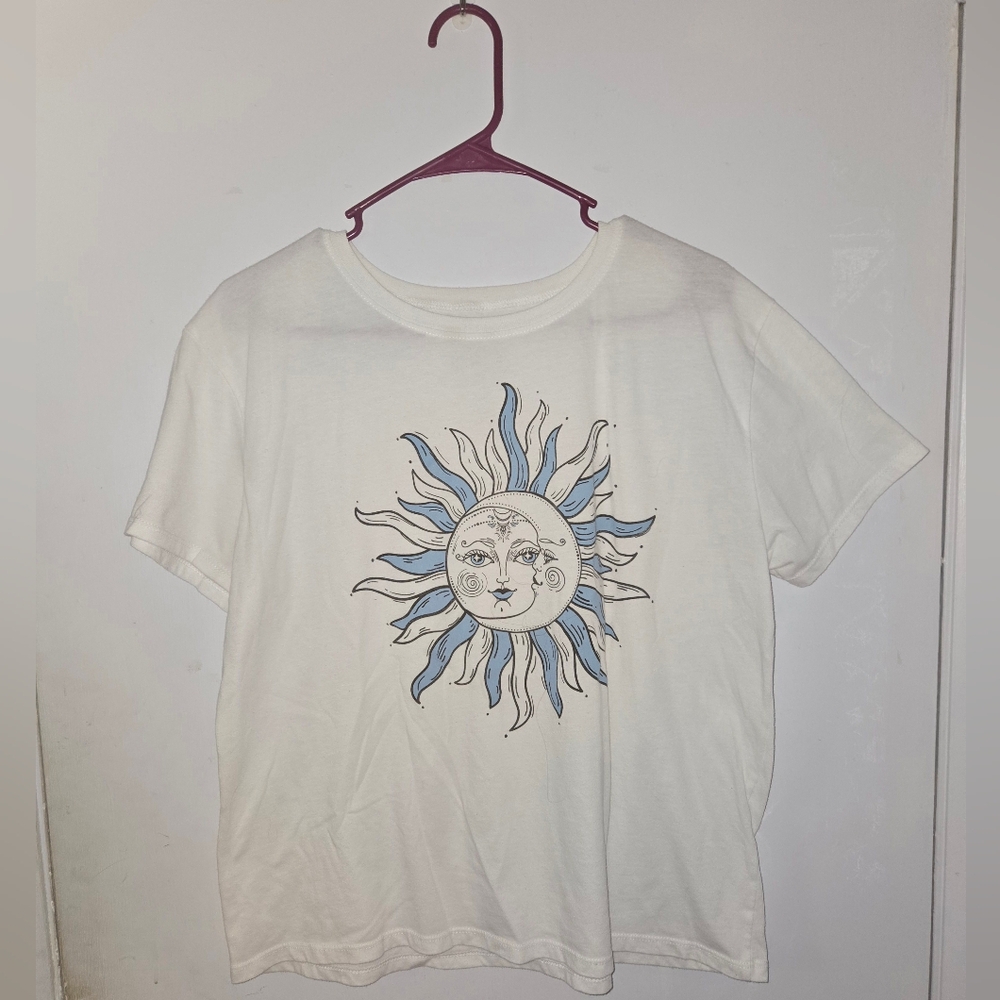 White Graphic Tee with Sun and Moon Design